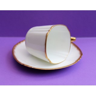 White gilt rim coffee cup...