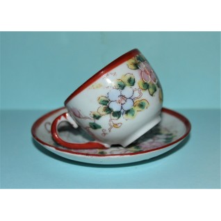 Cup and saucer with Kutani...