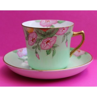 Green cup and saucer with...