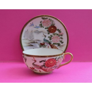 Cup and saucer with...